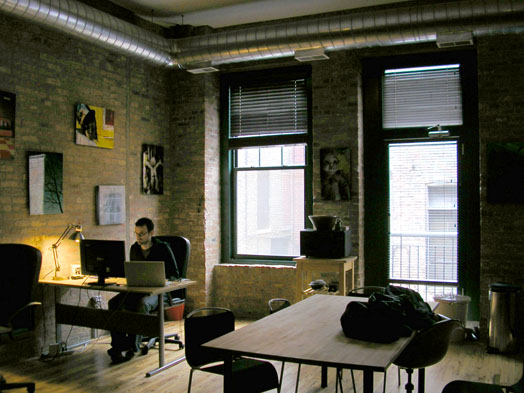 Web programmer Brett Yates works on his own terms at the COOP coworking space.  Photo: Ian Monroe/Medill